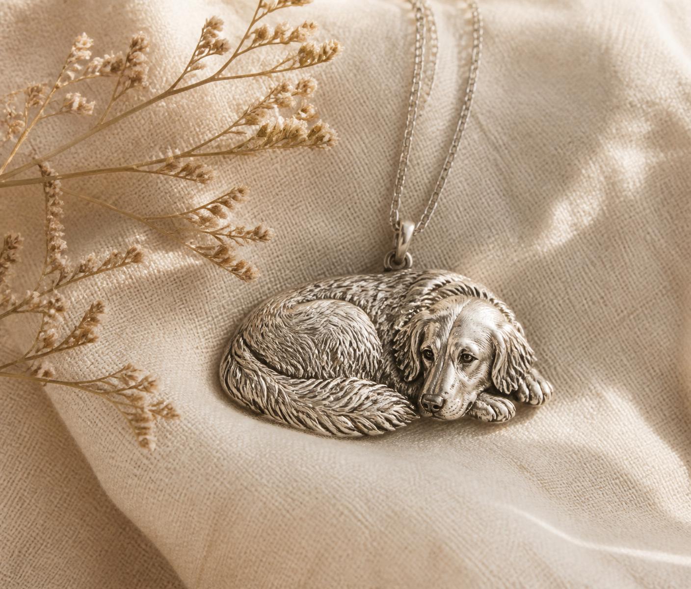 Silver cat pendant on linen with dried flowers